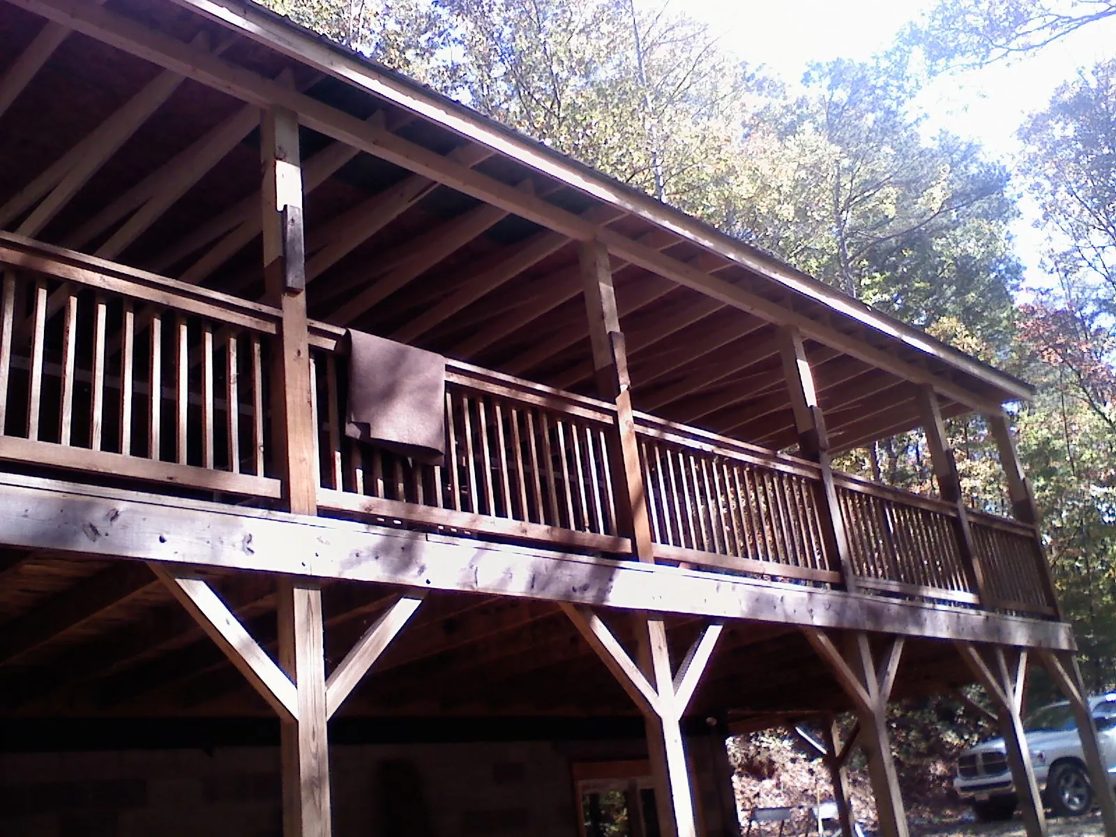 Timber framing under a new elevated porch and deck — Roof Leak Repair in Lenoir City by Roofing Brothers